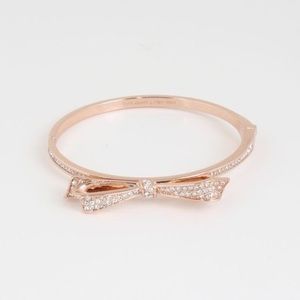Kate Spade Rose Gold Tone "Love Notes" Pave Crystal Bow
Hinged Bangle Bracelet